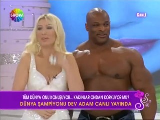Sexy Blonde Turkish Woman With Big Man On TV Show